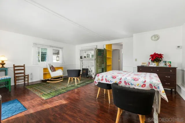 a kitchen with stainless steel appliances a stove a sink and a refrigerator