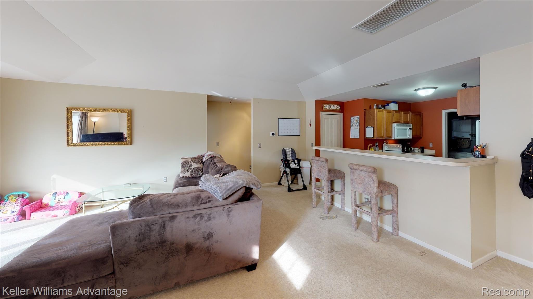 4057 Hampton Ridge Boulevard Howell, MI 48843 - Photo 24 of 25 4057-Hampton-Ridge-Blvd-Living-Room(1).jpg