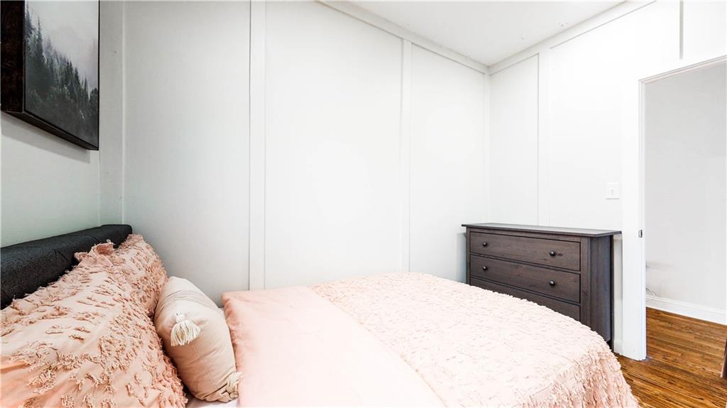 69 Atlanta Avenue Southwest Atlanta, GA 30315 - Photo 19 of 29 a bedroom with a bed and a microwave