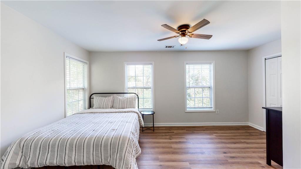 69 Atlanta Avenue Southwest Atlanta, GA 30315 - Photo 4 of 29 a bedroom with a large bed and a window