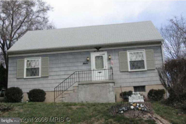 1024 St Albans Road Baltimore, MD 21239 - Photo 1 of 1 a view of a house with a yard