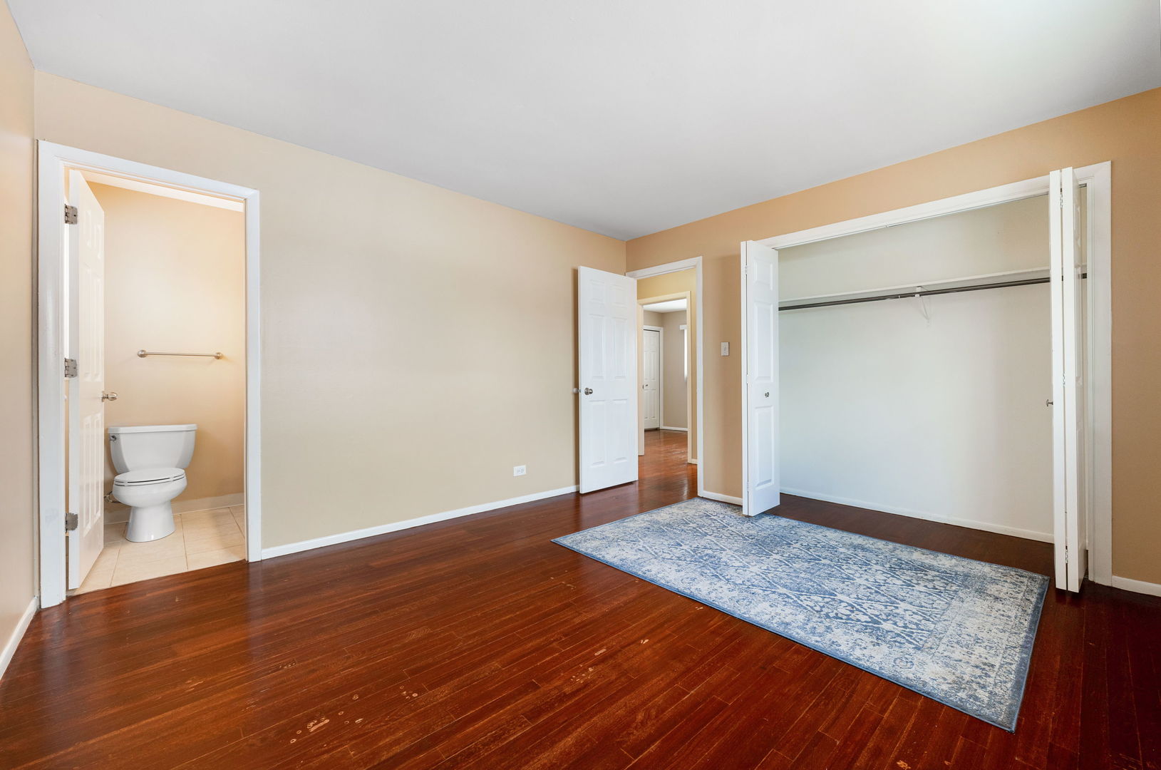 920 Valley Stream Drive Wheeling, IL 60090 - Photo 13 of 29 a view of an empty room with glass door and wooden floor