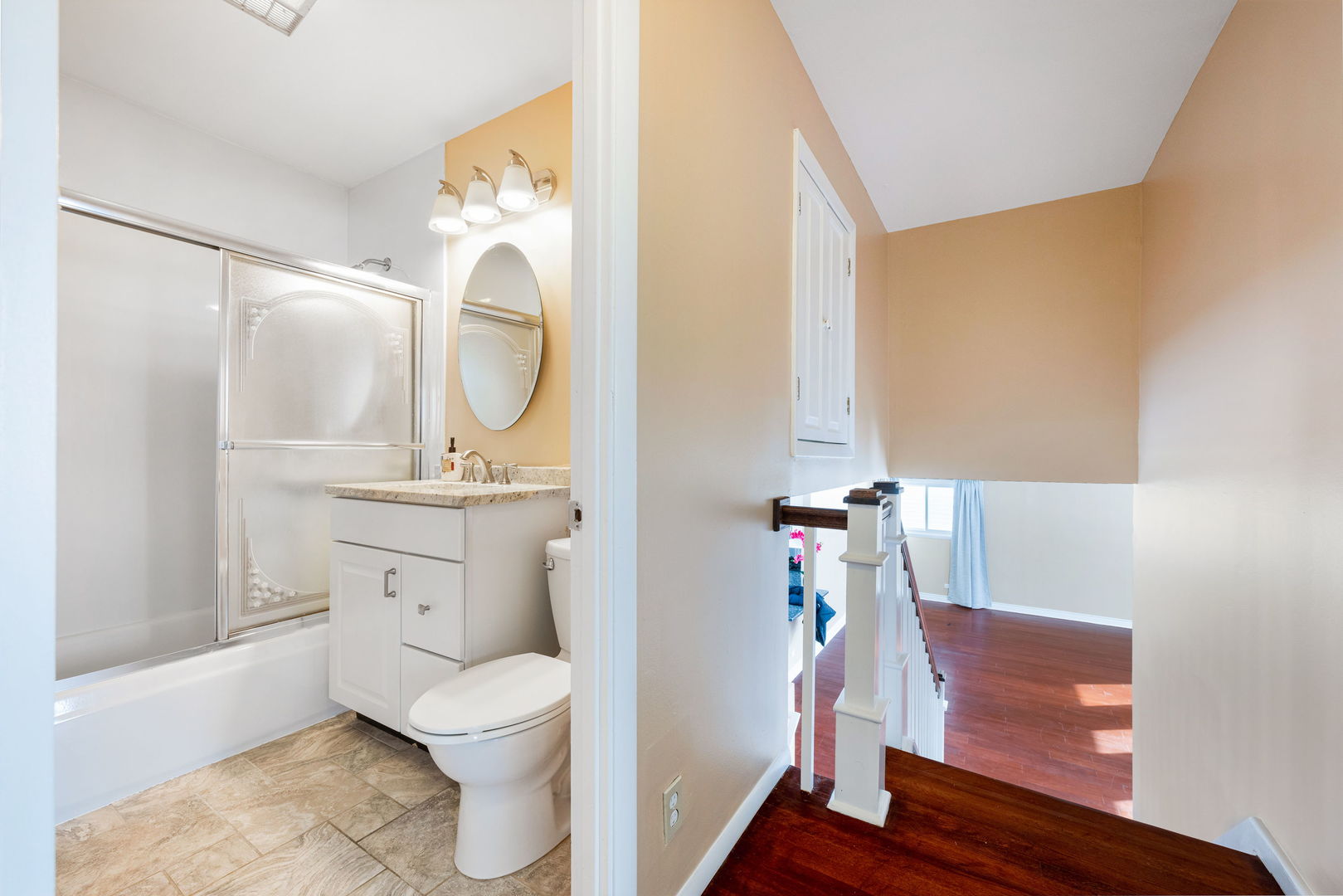 920 Valley Stream Drive Wheeling, IL 60090 - Photo 20 of 29 a bathroom with a toilet a sink and a mirror