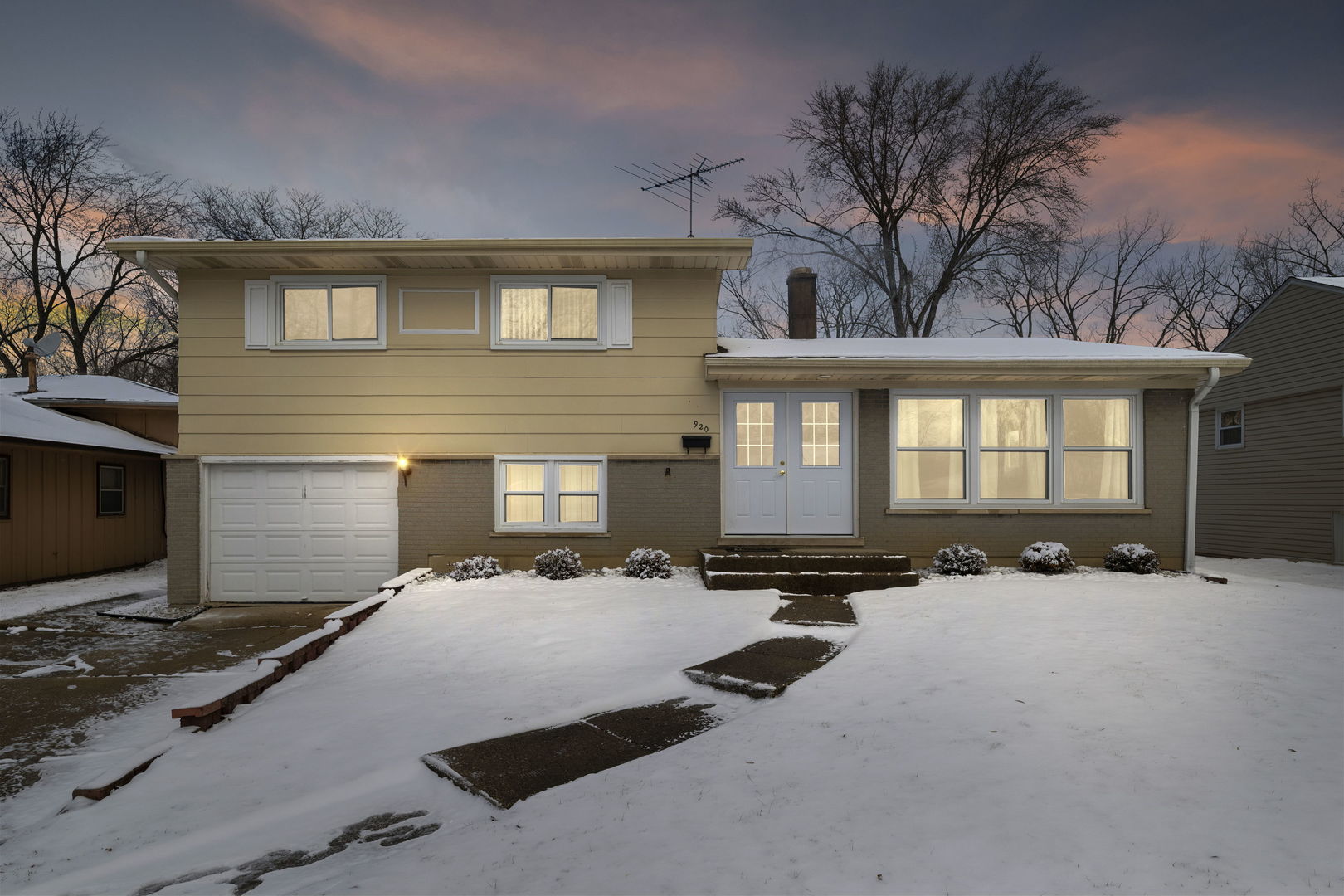 920 Valley Stream Drive Wheeling, IL 60090 - Photo 2 of 29 a front view of a house with a yard