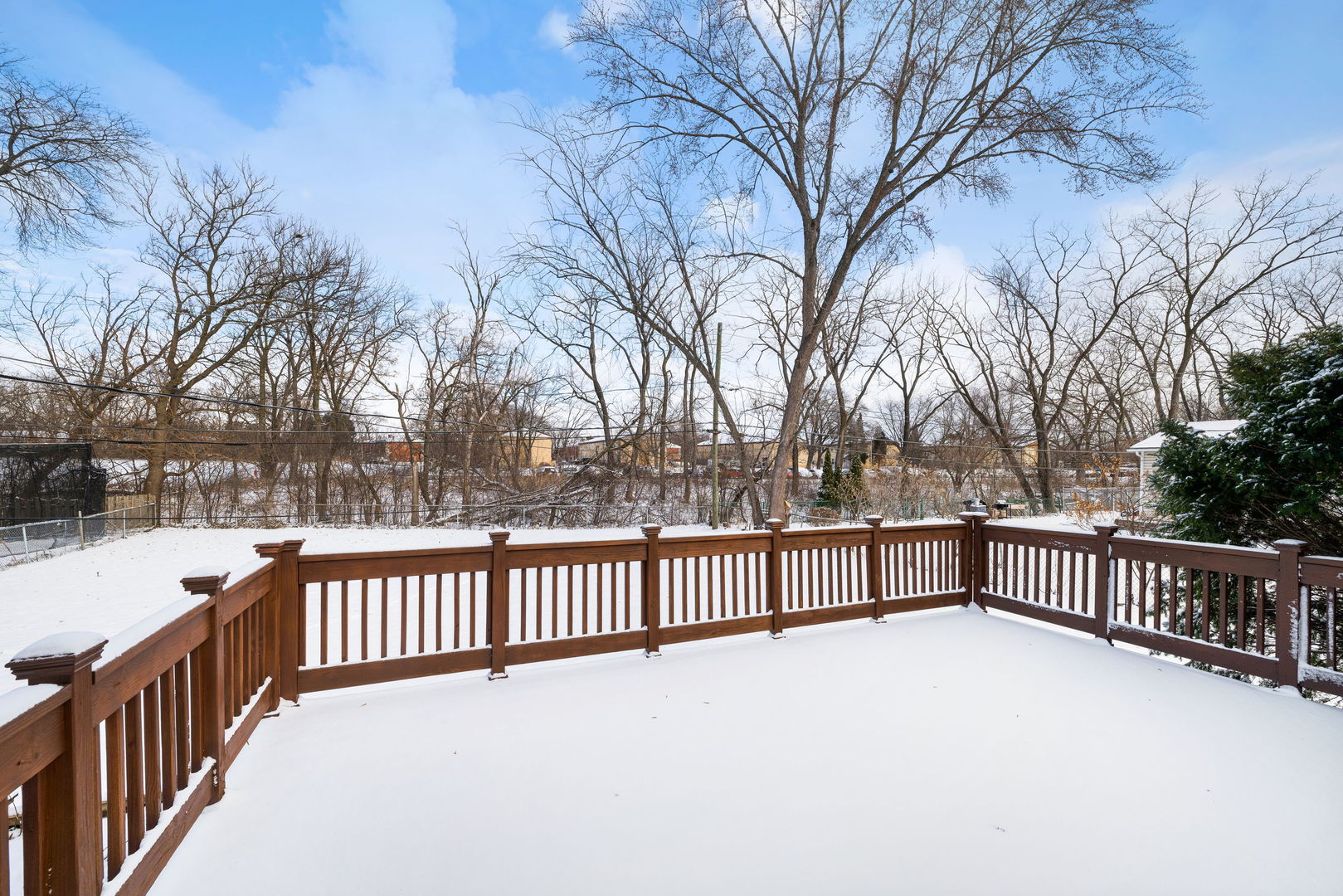920 Valley Stream Drive Wheeling, IL 60090 - Photo 27 of 29 a view of a street with a fence and trees