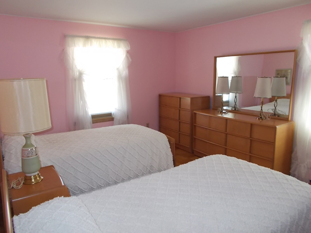 201 Maple Street Cedar Point, IL 61316 - Photo 8 of 12 a bedroom with a bed and a closet