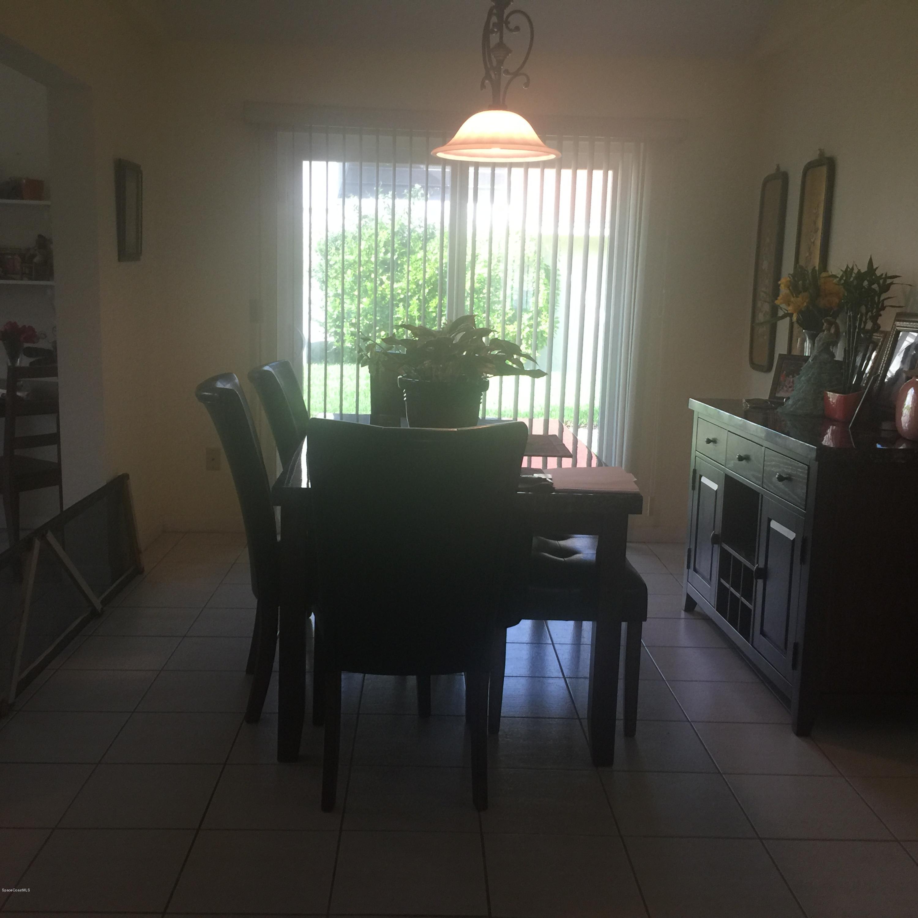 312 Myrtlewood Road Melbourne, FL 32940 - Photo 3 of 8 Dining Room7658243
