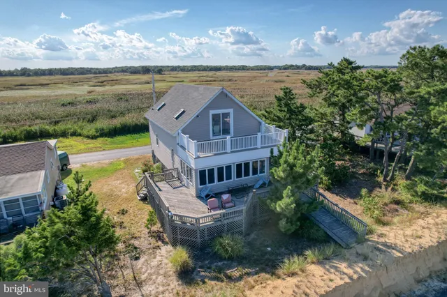 a view of a house with a lake view