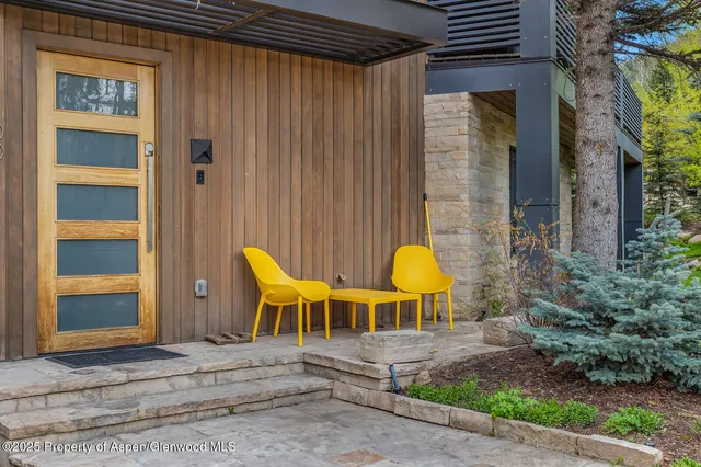 a view of backyard with plants and garden