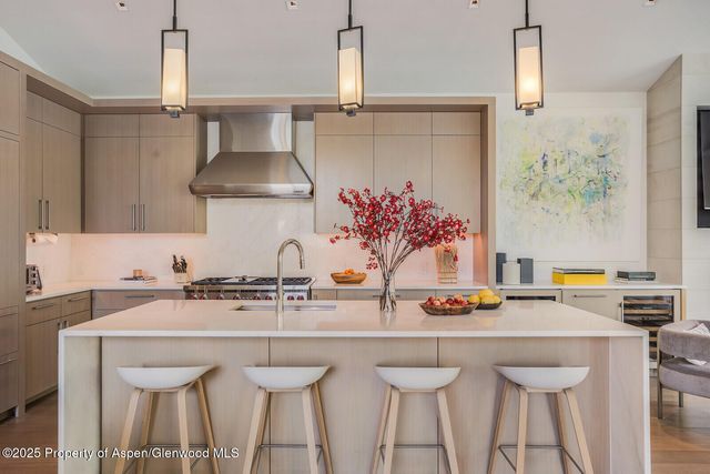 a kitchen with a sink and a table