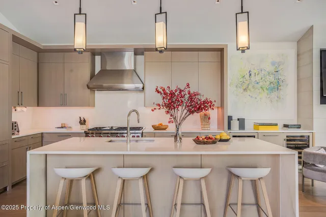 a kitchen with a sink and a table