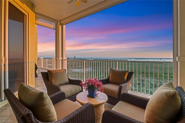 a balcony view with a couch