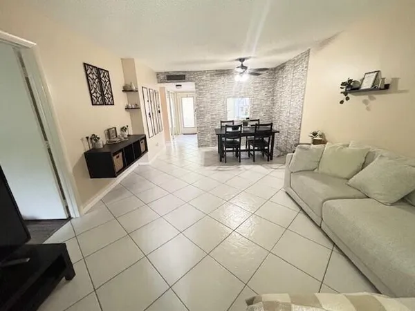 a living room with furniture and a couch