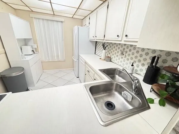 a bathroom with a sink and bathtub