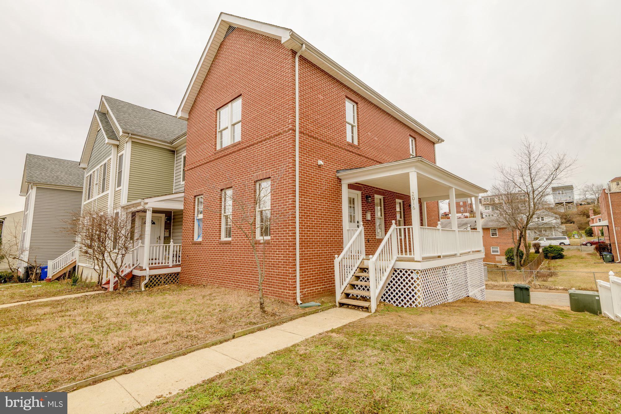 2016 South Glebe Road Arlington, VA 22204 - Photo 1 of 27 a view of a house with snow on the wall