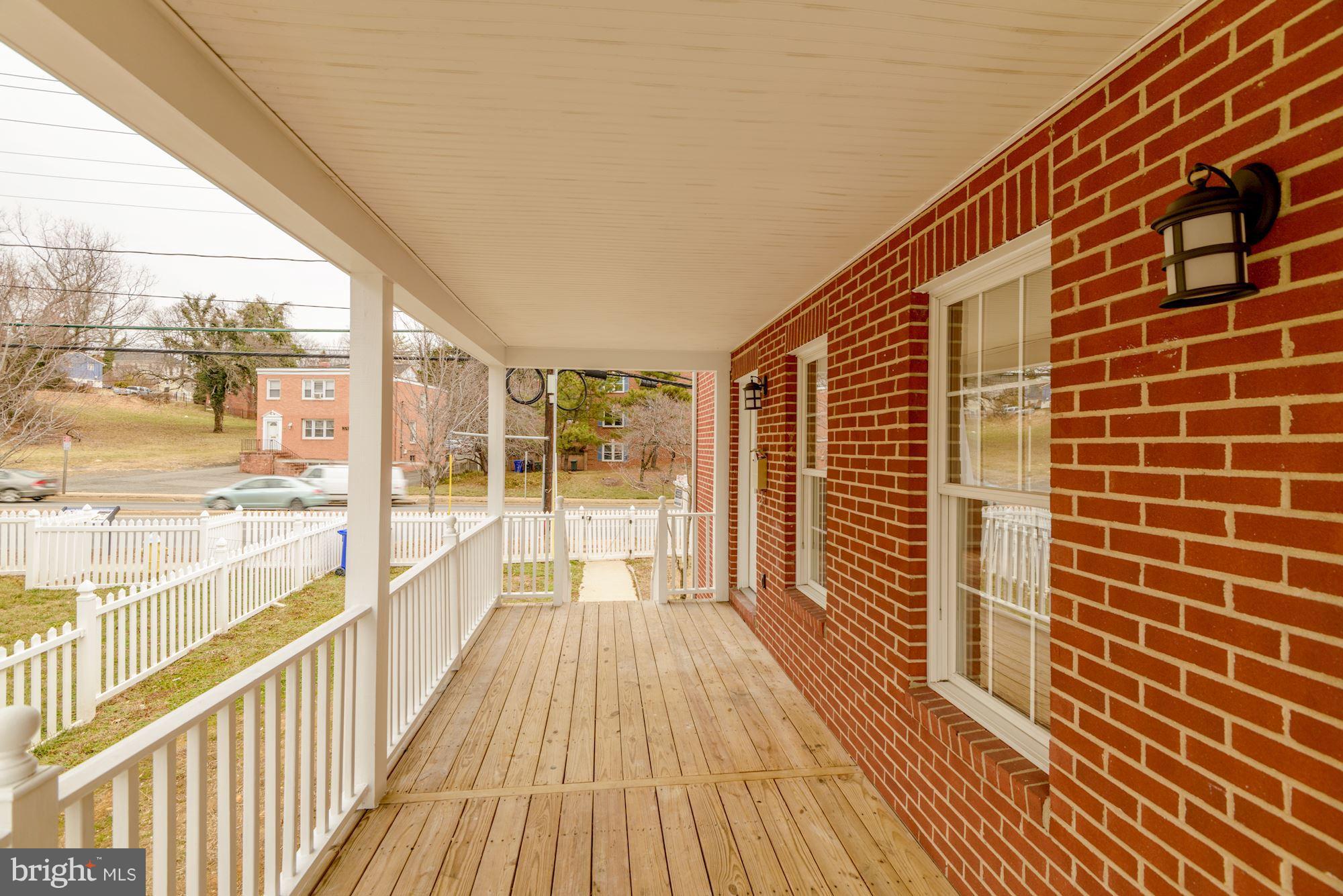 2016 South Glebe Road Arlington, VA 22204 - Photo 3 of 27 a view of a balcony with wooden floor