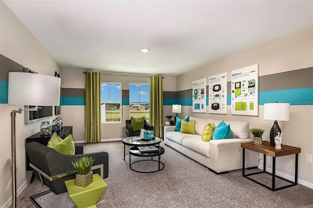 a living room with furniture and a lamp