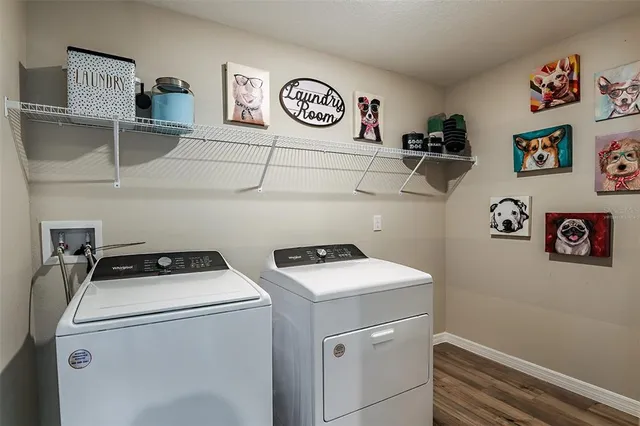 a utility room with dryer and washer