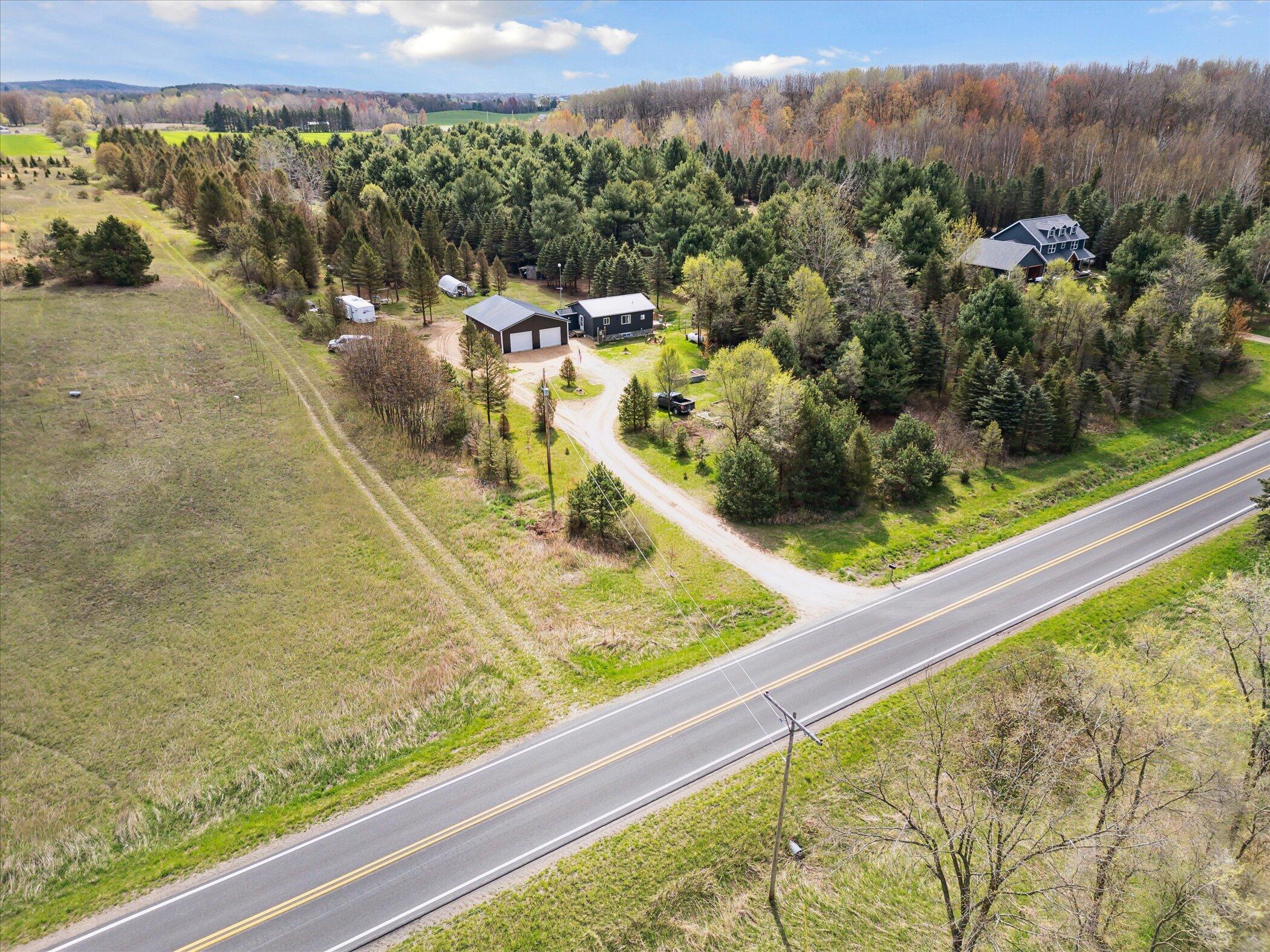 1366 Grow Road Northwest Stanton, MI 48888 - Photo 31 of 48 50-1366-Grow-Rd-NW-Stanton-MI-48888-Wind