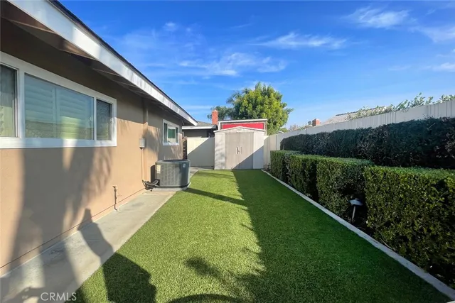 a view of a backyard with plants