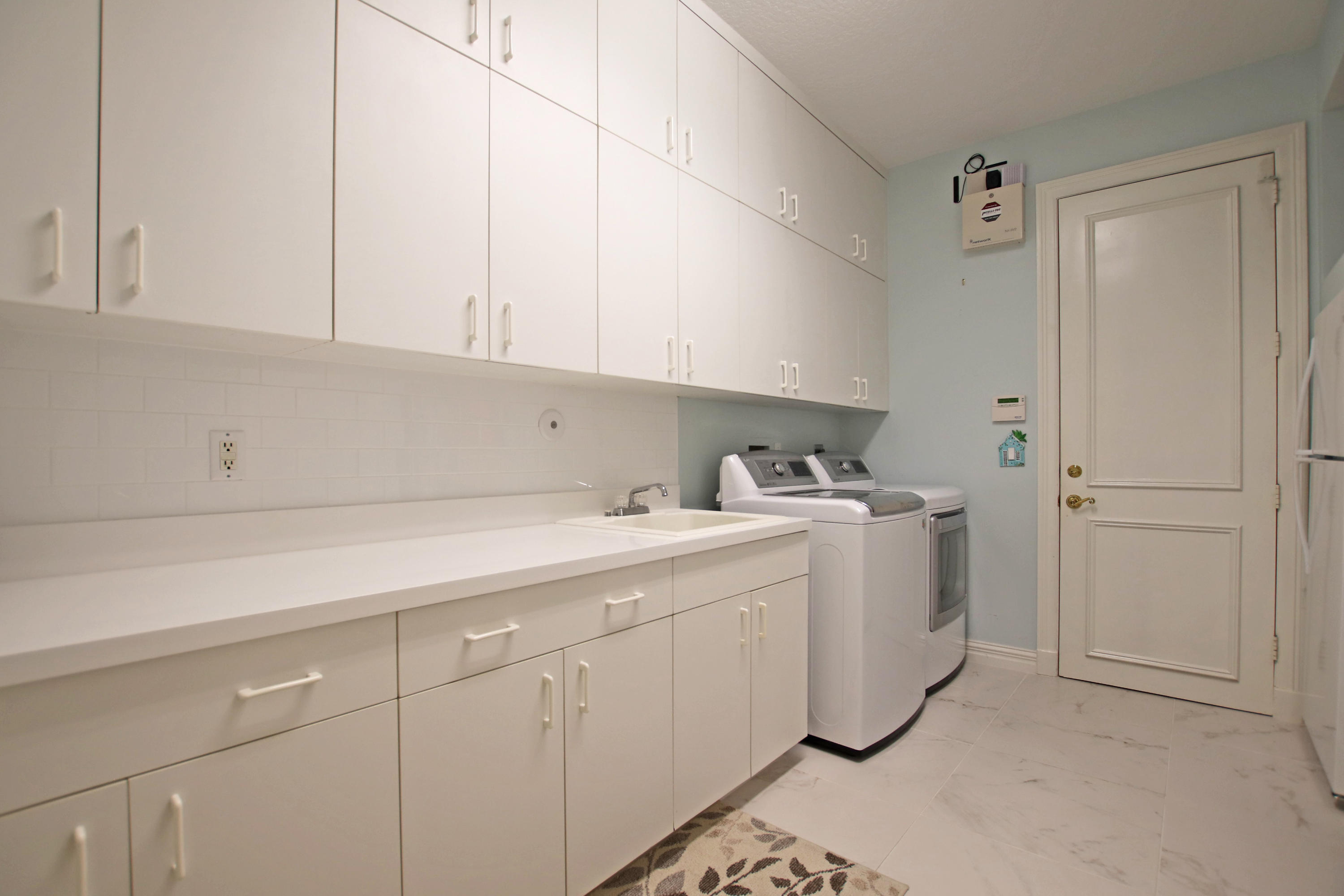 19 Bayview Road Tequesta, FL 33469 - Photo 36 of 54 Laundry Room