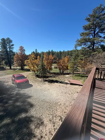a view of a road with houses on the road