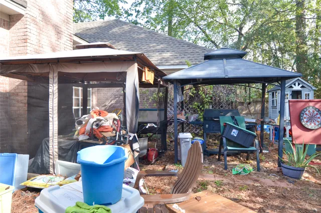 a view of balcony with furniture