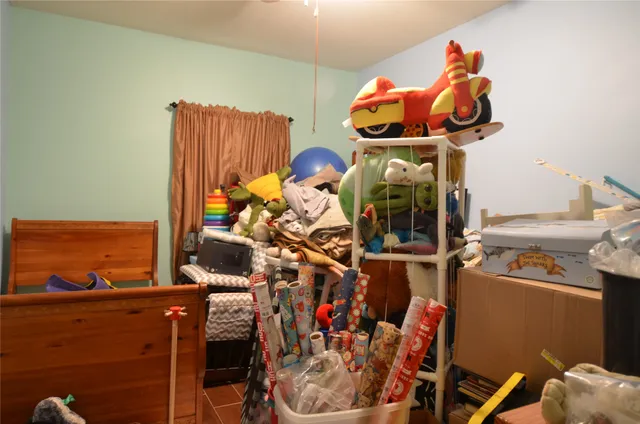 a room with furniture and a bed