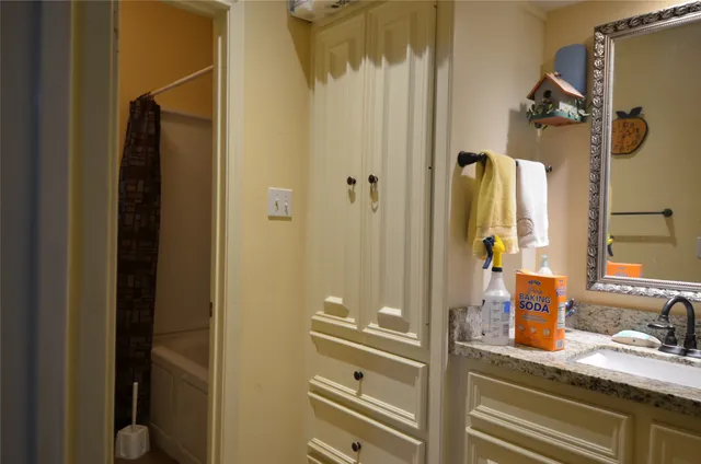 a very nice looking room with many shelves