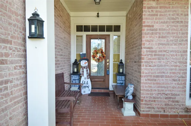 a front view of a house with outdoor space