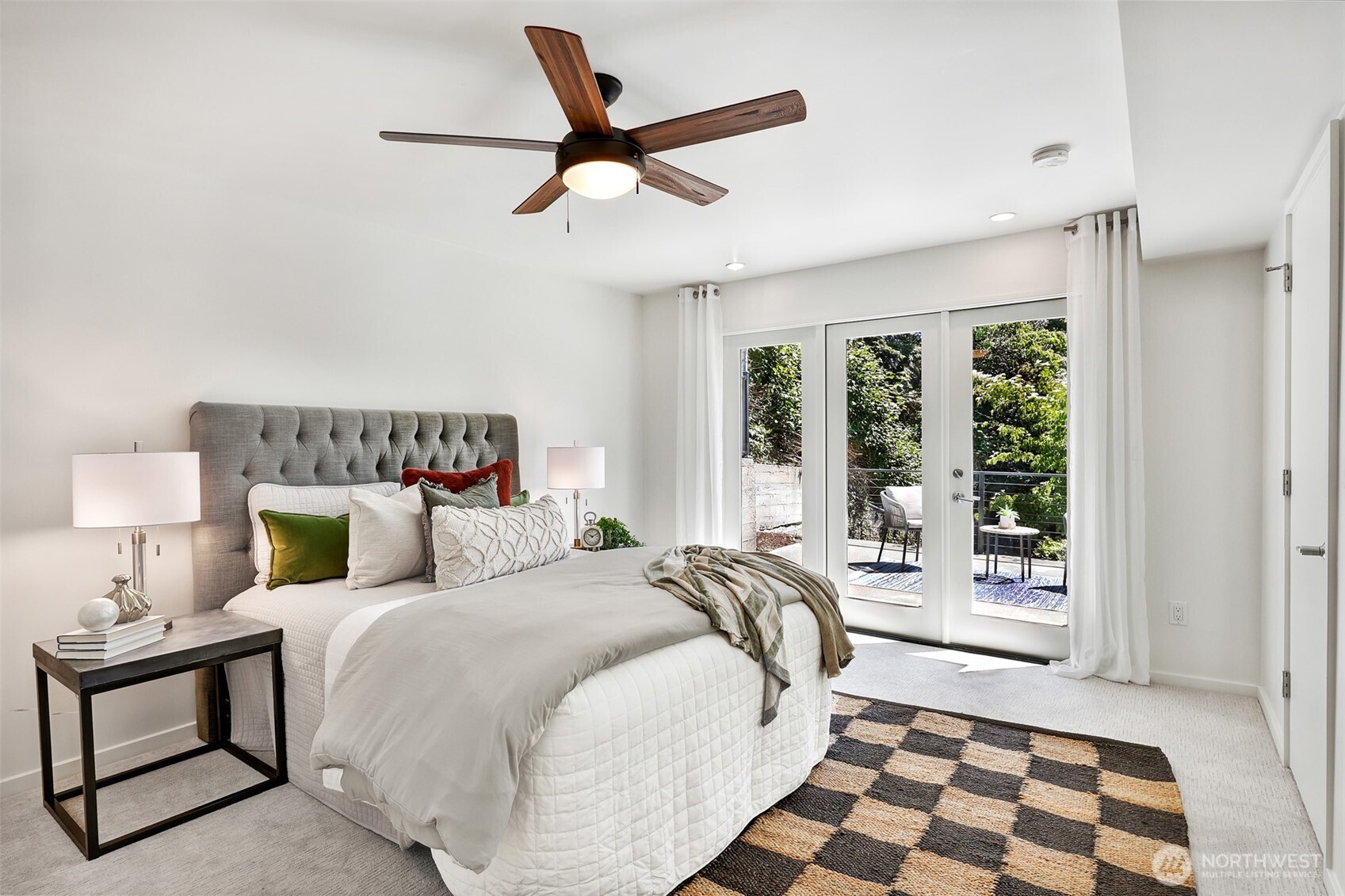 2547 Northeast 83rd Street Seattle, WA 98115 - Photo 25 of 38 a bedroom with a large bed and a window