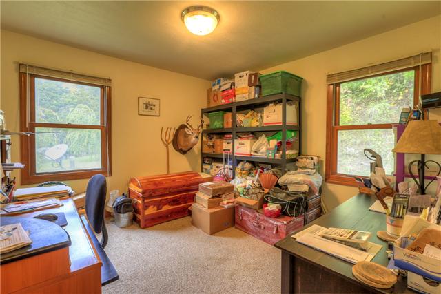 550 Puncheon Creek Road Lafayette, TN 37083 - Photo 12 of 20 Your guests will have plenty of space in this secondary bedroom! It could also be a great space for a home office!