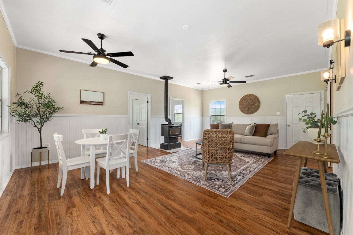 2100 Pump Station Road Wimberley, TX 78676 - Photo 1 of 1 a living room with furniture and a potted plant