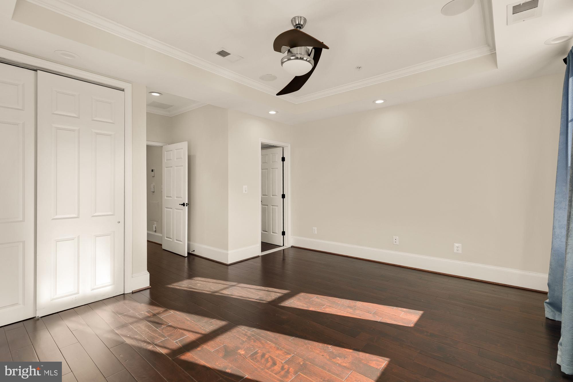 1609 Levis Street Northeast Washington, DC 20002 - Photo 18 of 35 a view of an empty room with wooden floor