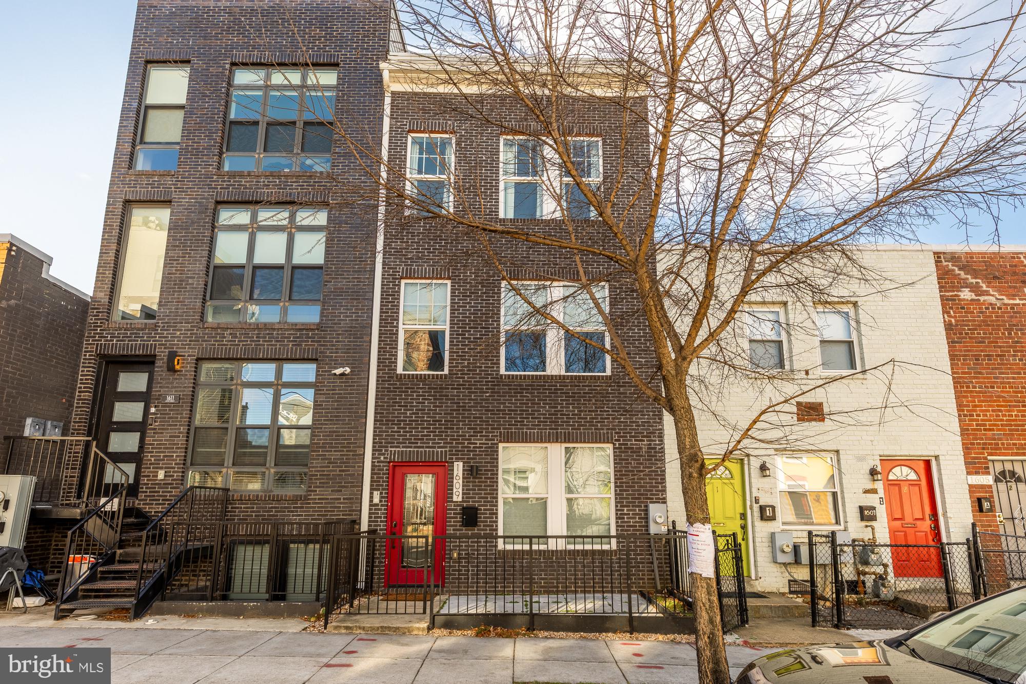 1609 Levis Street Northeast Washington, DC 20002 - Photo 2 of 35 a front view of a multi story building