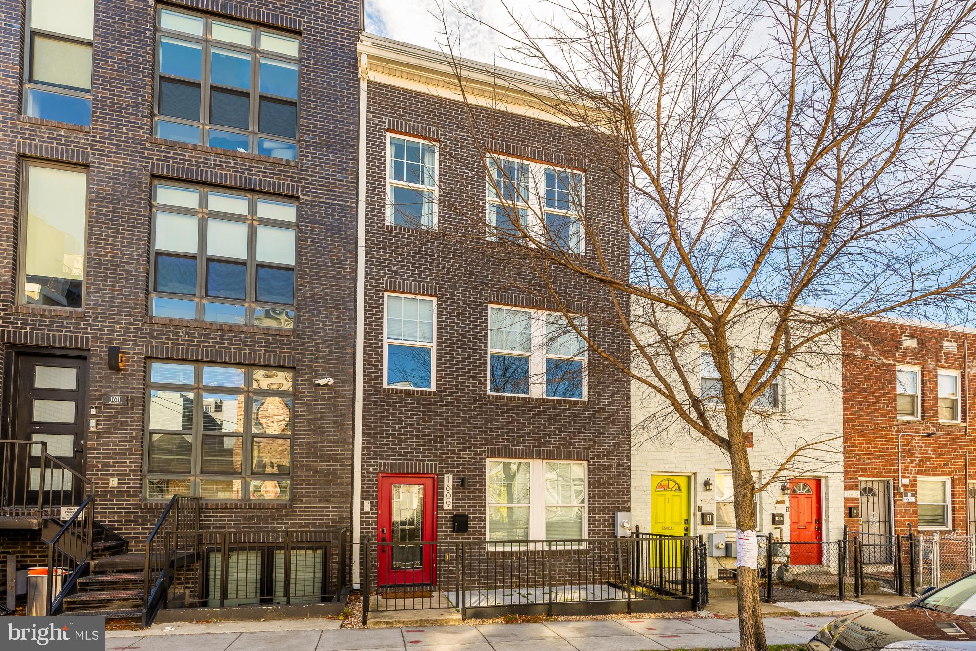 1609 Levis Street Northeast Washington, DC 20002 - Photo 3 of 35 a view of a brick building next to a road