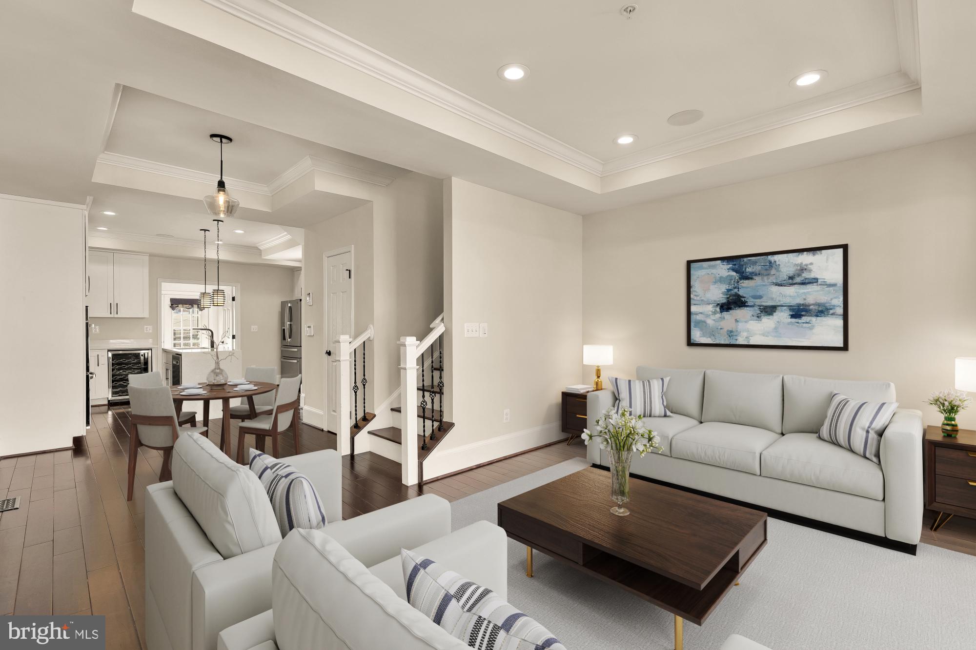 1609 Levis Street Northeast Washington, DC 20002 - Photo 5 of 35 a living room with furniture and a chandelier