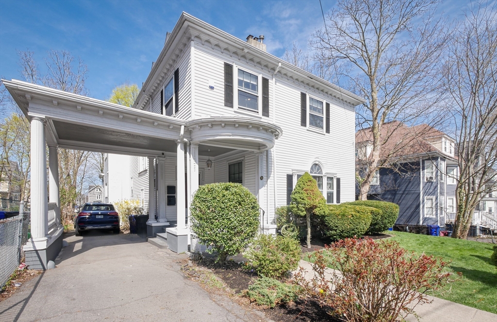 11 Wayne Street Boston, MA 02121 - Photo 2 of 27 a view of a car park in front of house