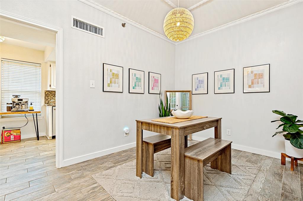 3642 Word Street Dallas, TX 75204 - Photo 13 of 29 a view of a dining room with furniture