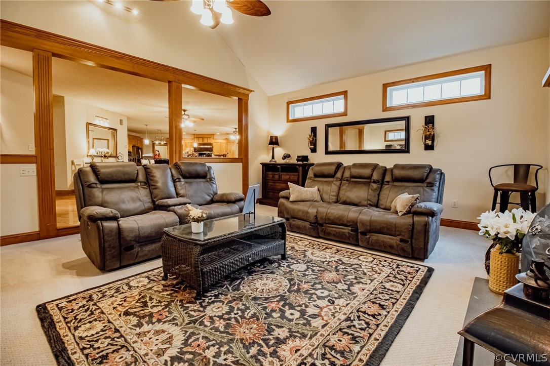 6809 West Quaker Road Disputanta, VA 23842 - Photo 16 of 49 a living room with furniture and a rug