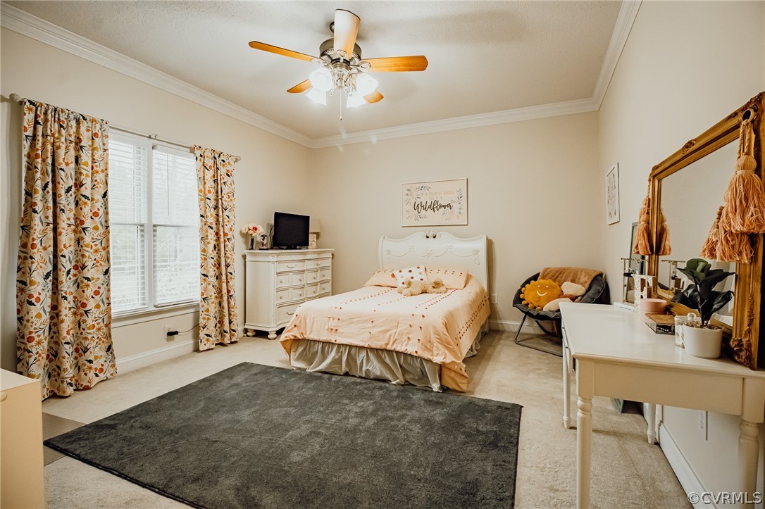 6809 West Quaker Road Disputanta, VA 23842 - Photo 21 of 49 a bedroom with a bed a couch and dresser