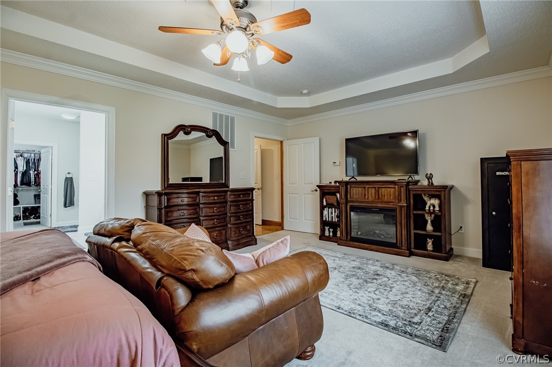 6809 West Quaker Road Disputanta, VA 23842 - Photo 30 of 49 a living room with furniture and a flat screen tv with wooden floor