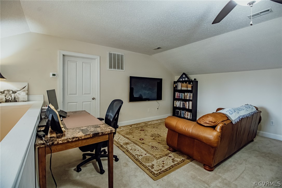 6809 West Quaker Road Disputanta, VA 23842 - Photo 37 of 49 a workspace with furniture and a couch