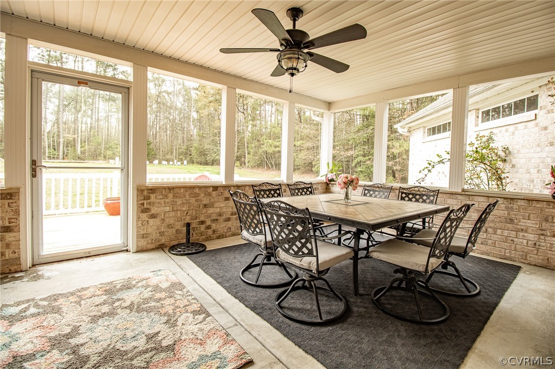 6809 West Quaker Road Disputanta, VA 23842 - Photo 40 of 49 a view of a dining room with furniture window and outside view