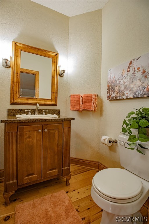 6809 West Quaker Road Disputanta, VA 23842 - Photo 4 of 49 a bathroom with a toilet sink and mirror