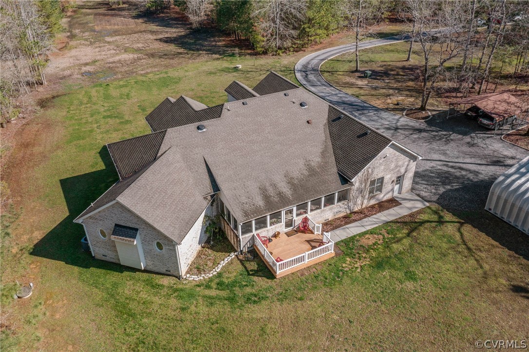 6809 West Quaker Road Disputanta, VA 23842 - Photo 46 of 49 a view of a house with a yard and sitting area