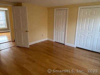 175 Pine Street Columbia, CT 06237 - Photo 27 of 29 an empty room with wooden floor