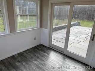 a view of an empty room and window