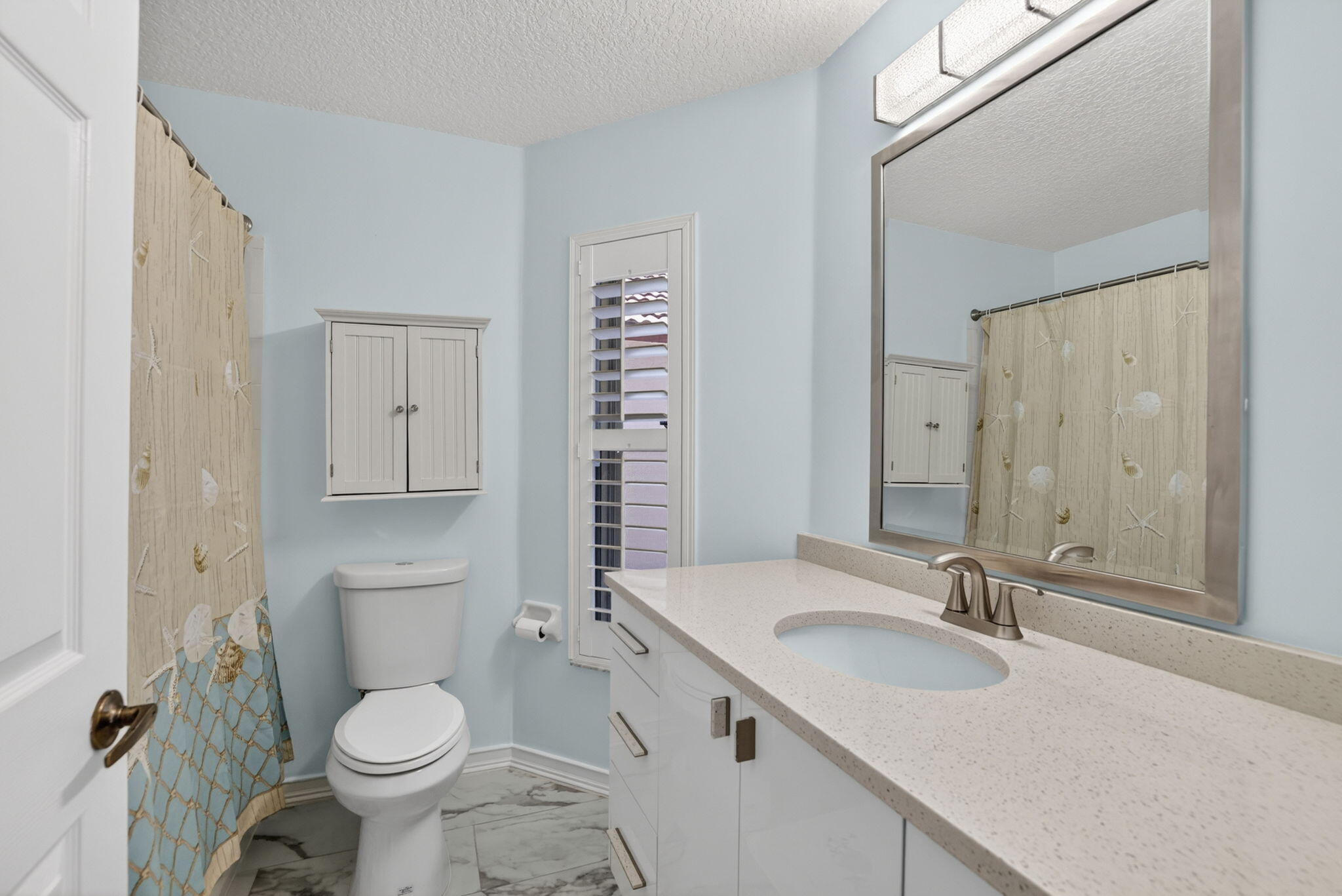 2097 Bonisle Circle Riviera Beach, FL 33418 - Photo 18 of 35 Guest Bathroom