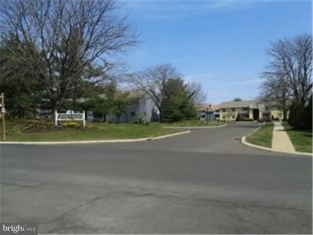a sign broad on the side of a road